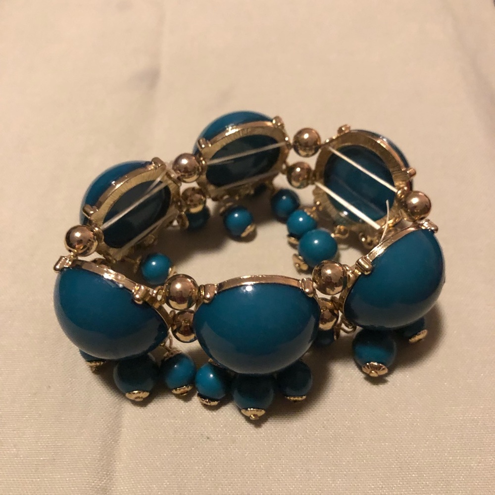 Blue bracelet.